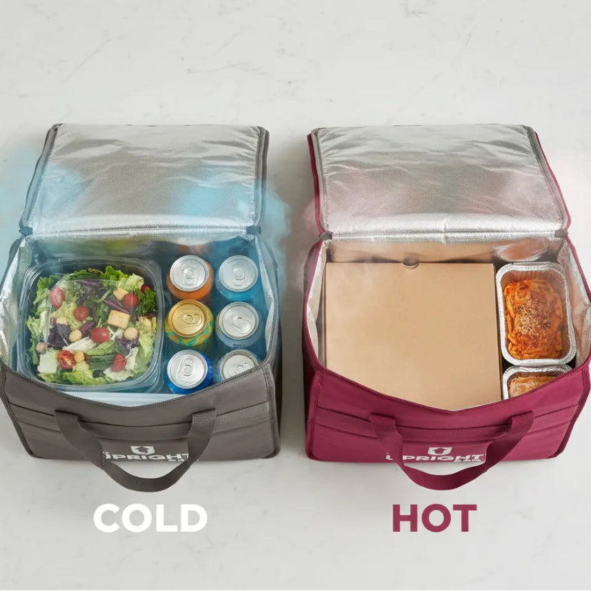 Two insulated delivery bags, one labeled 'Cold' with a salad and drinks, the other labeled 'Hot' with a sandwich and soup.