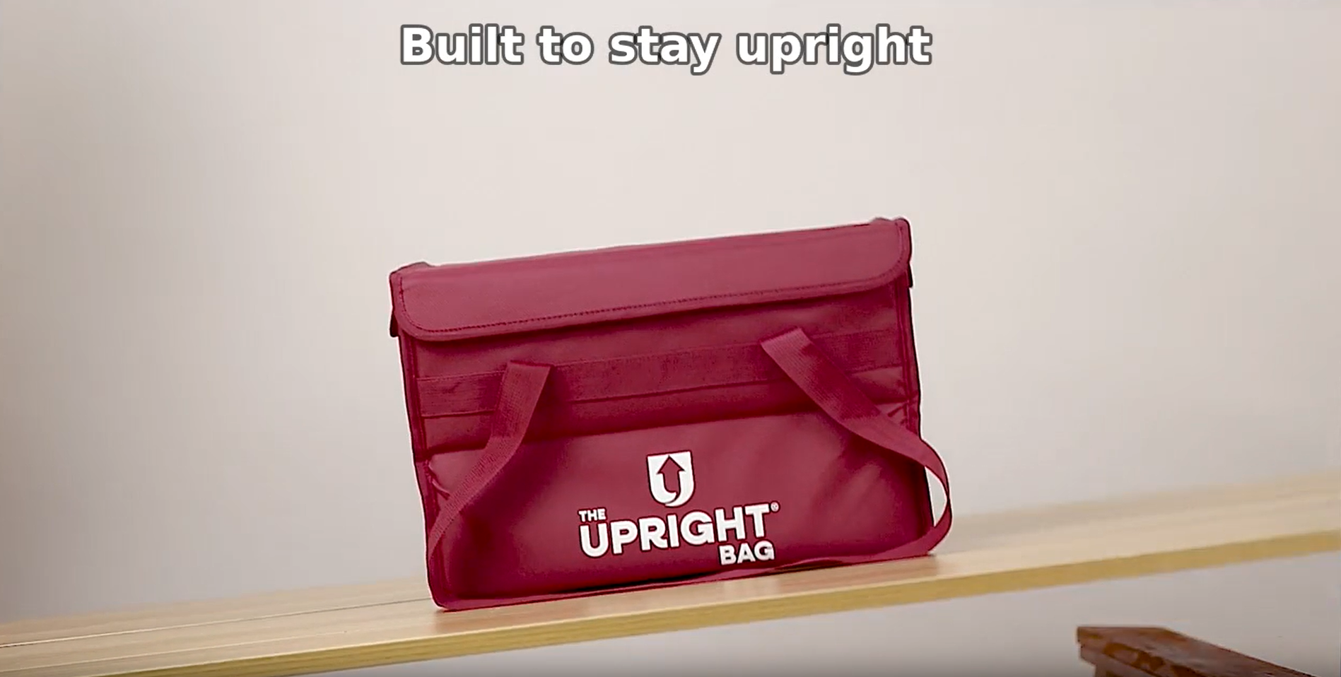 Insulated food delivery bag by The Upright Bag showing patented weighted base design built to stay upright during delivery.